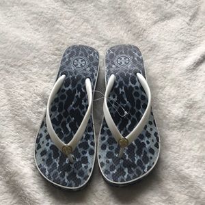 New, never worn Tory Burch wedge flip flops
